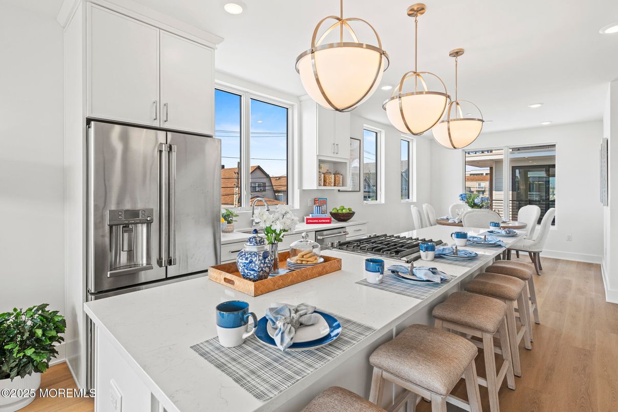 Dining room, Interior, Kitchen, Pendant Lights, Recessed Lighting, Stainless Steel Appliances, Wood Texture Flooring
