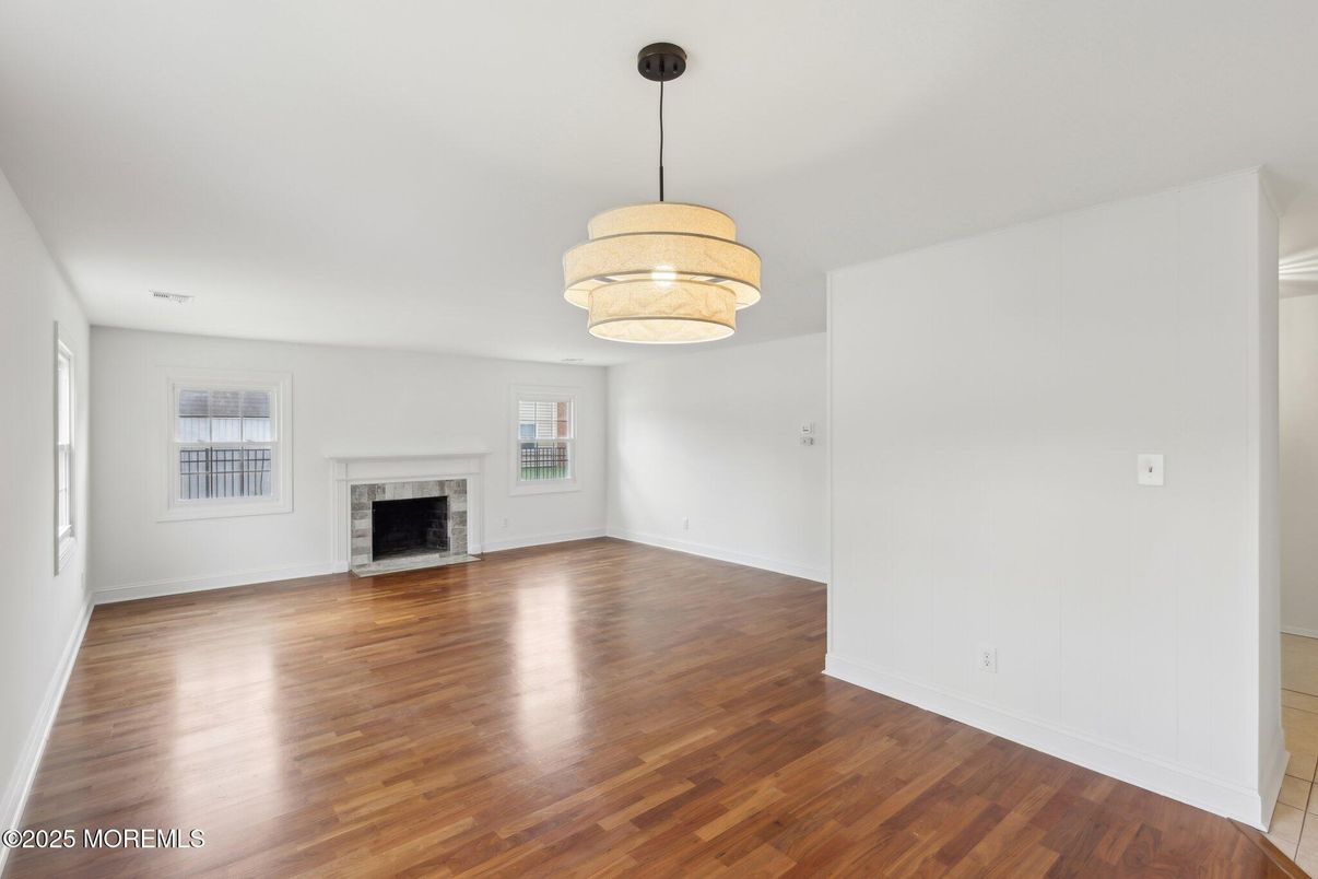 Empty room, Fireplace, Interior, Pendant Lights, Wood Texture Flooring