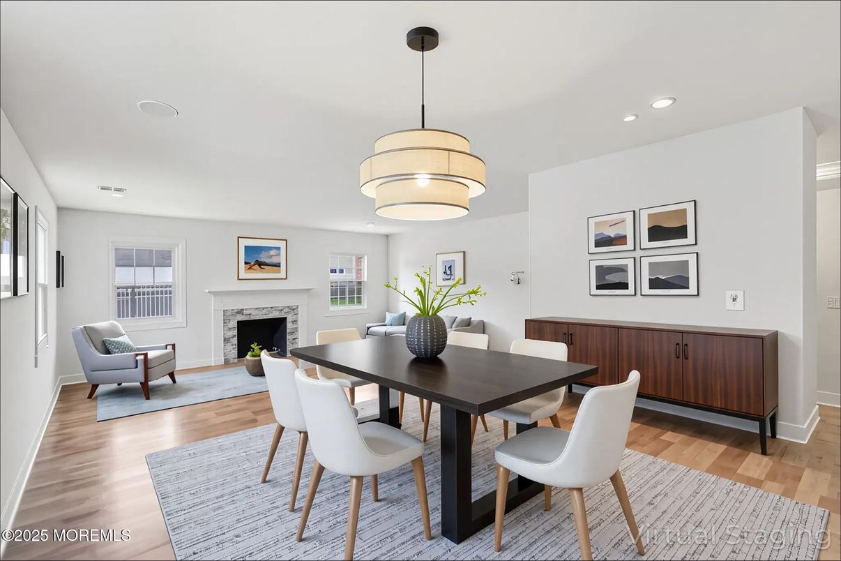 Dining room, Fireplace, Interior, Pendant Lights, Recessed Lighting, Wood Texture Flooring