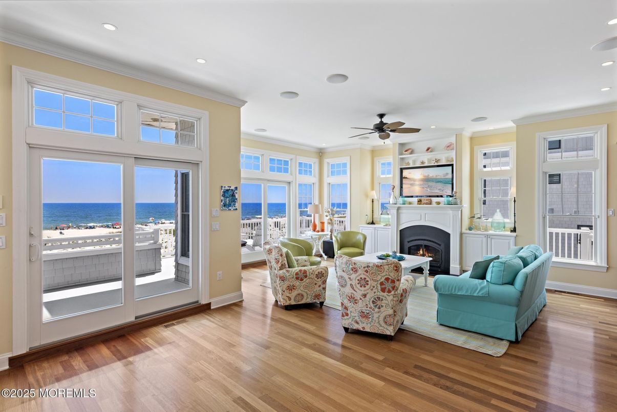 Fireplace, Interior, Living room, Recessed Lighting, Water, Wood Texture Flooring