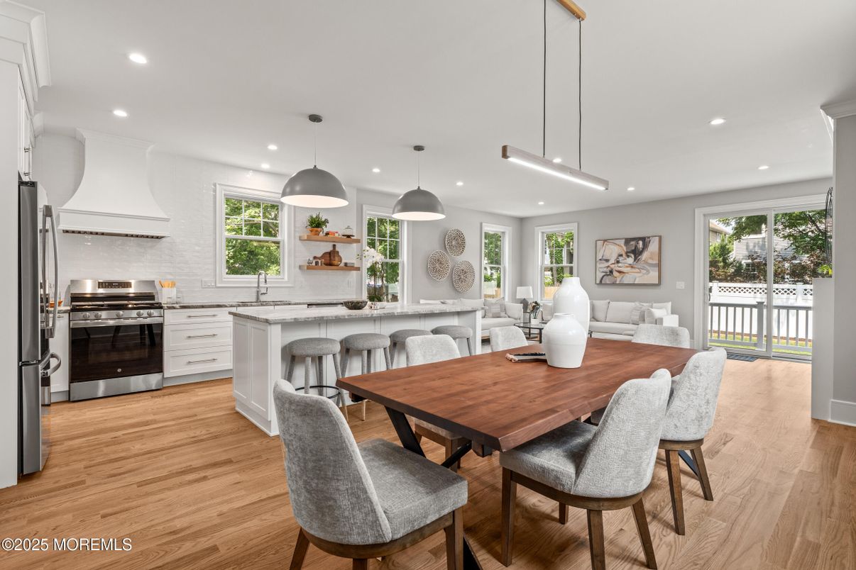 Dining room, Interior, Kitchen, Pendant Lights, Recessed Lighting, Stainless Steel Appliances, Wood Texture Flooring