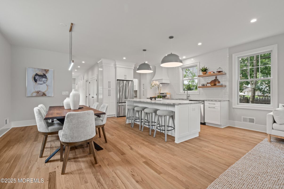Dining room, Interior, Kitchen, Pendant Lights, Recessed Lighting, Stainless Steel Appliances, Wood Texture Flooring