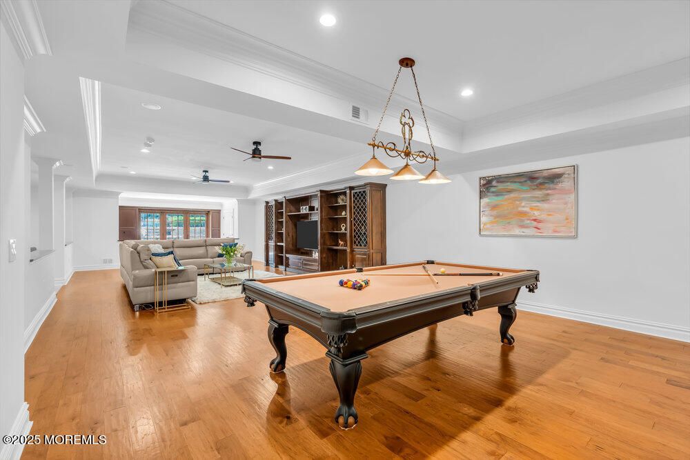 Billiard Table, Game Room, Interior, Living room, Pendant Lights, Recessed Lighting, Wood Texture Flooring