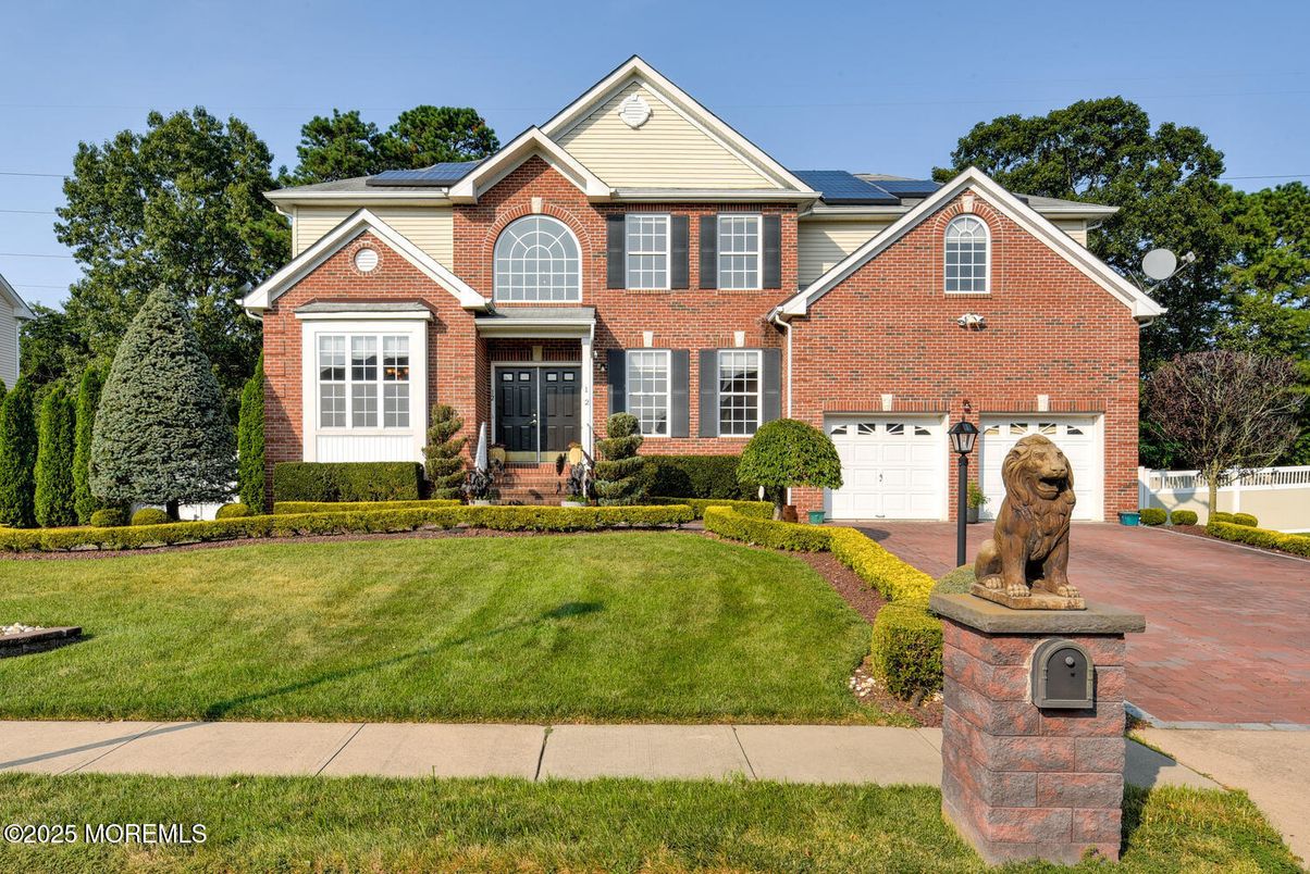 Attached, Exterior, Facade, Brick Facade, Solar Panels, Brick Traditional