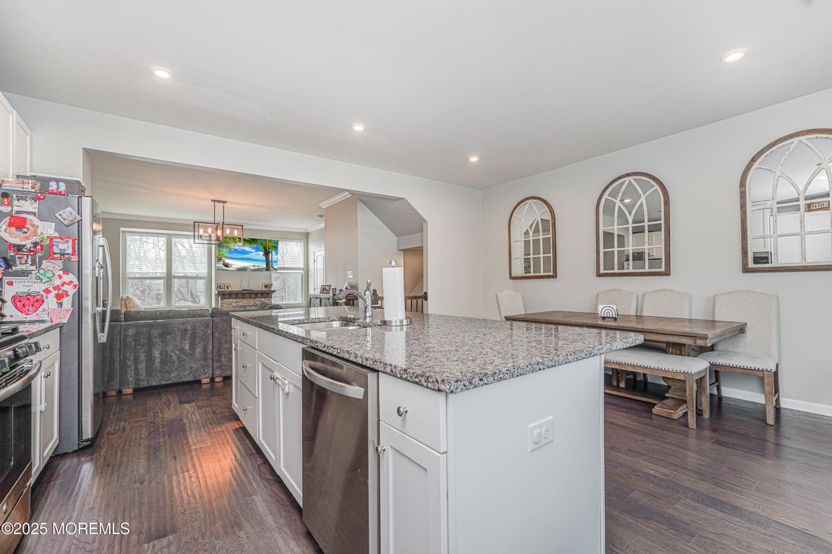 Dining room, Interior, Kitchen, Pendant Lights, Recessed Lighting, Stainless Steel Appliances, Wood Texture Flooring