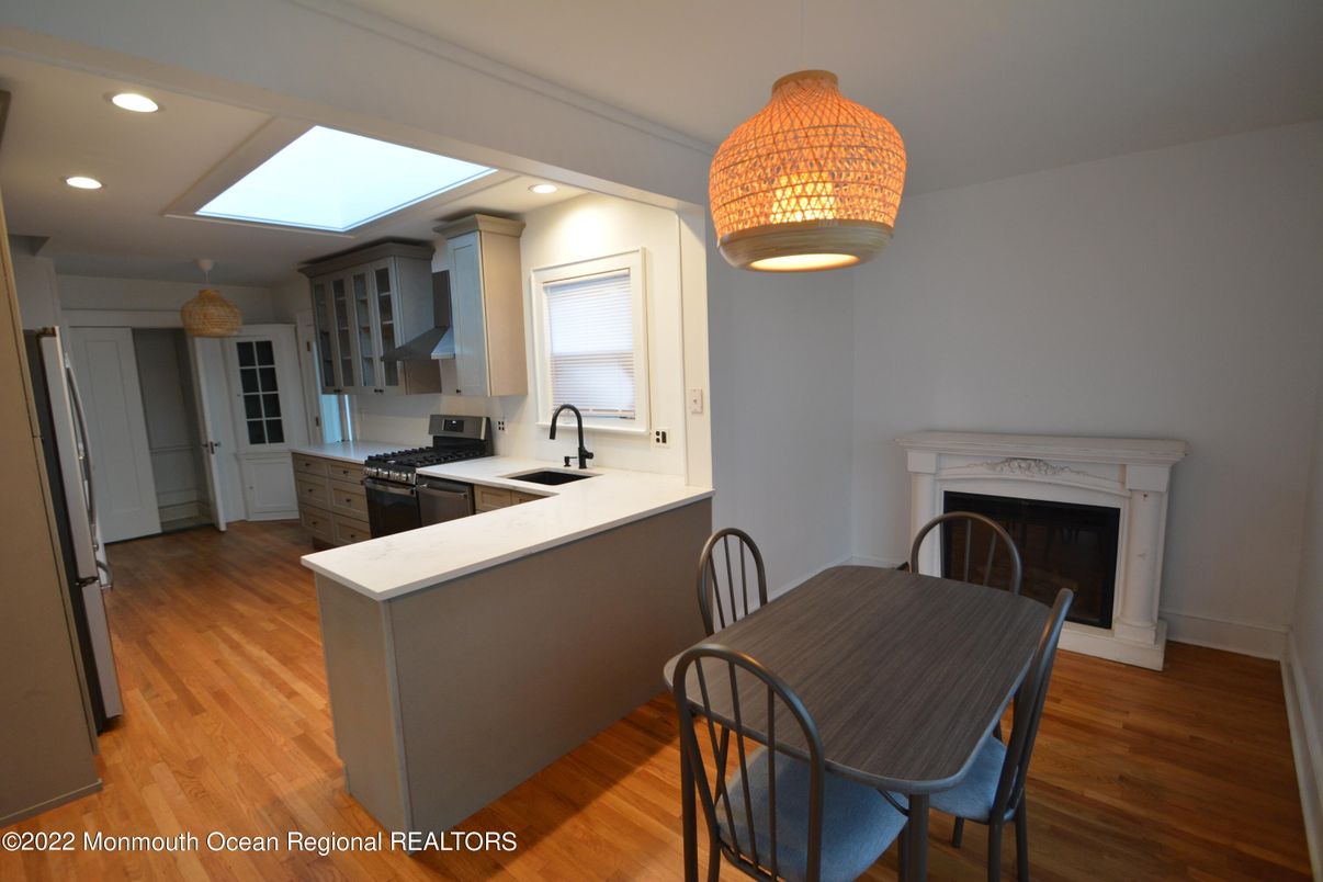 Fireplace, Interior, Kitchen, Recessed Lighting, Wood Texture Flooring