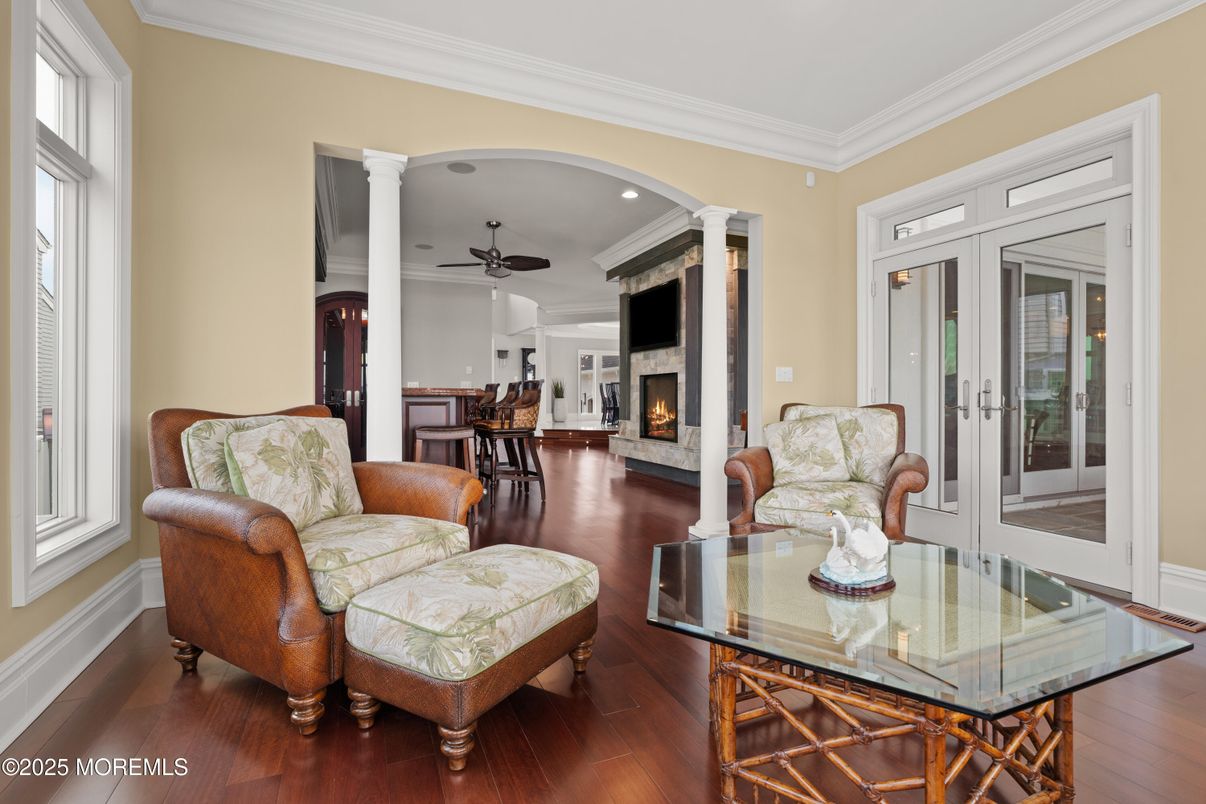 Dining room, Fireplace, Interior, Living room, Recessed Lighting, Wood Texture Flooring