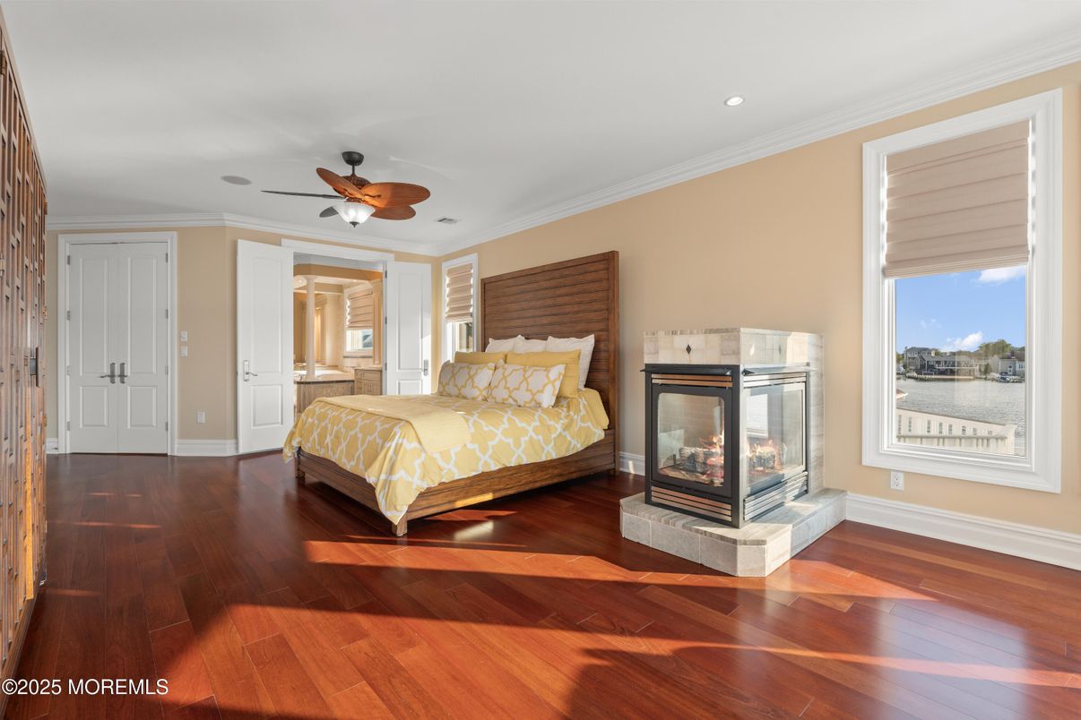 Bedroom, Fireplace, Interior, Recessed Lighting, Wood Texture Flooring