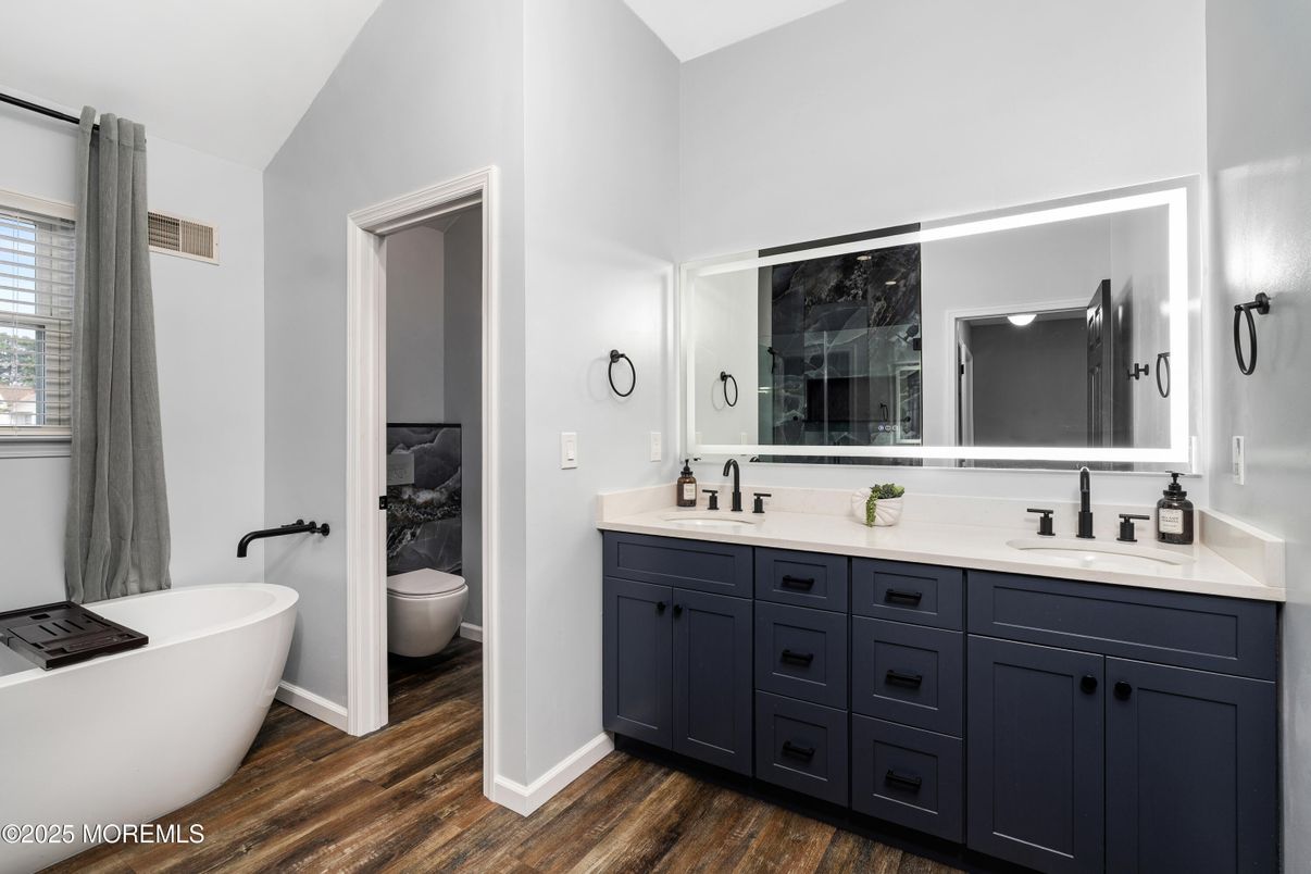 Bathroom, Dual Sink Vanities, Free Standing Baths, Interior, Wood Texture Flooring