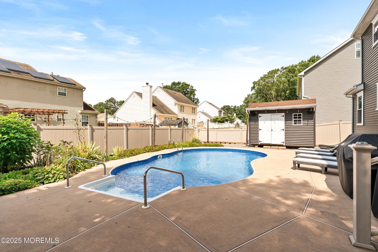Exterior, Pool, Solar Panels