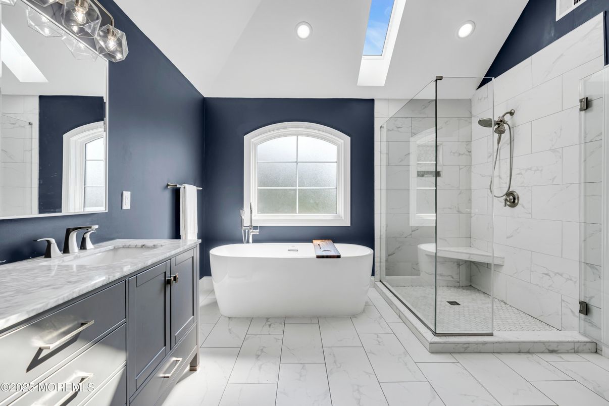 Bathroom, Dual Sink Vanities, Free Standing Baths, Glass Shower, Interior, Marble, Marble Walls, Recessed Lighting