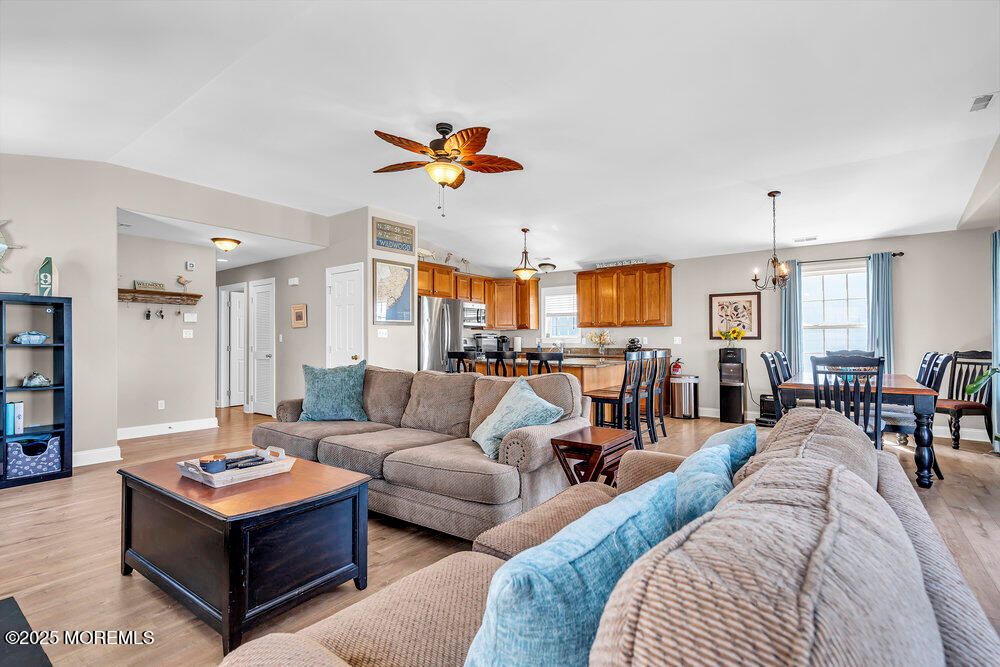 Dining room, Interior, Kitchen, Living room, Pendant Lights, Stainless Steel Appliances, Wood Texture Flooring