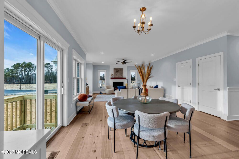Chandelier, Dining room, Fireplace, Interior, Recessed Lighting, Wood Texture Flooring