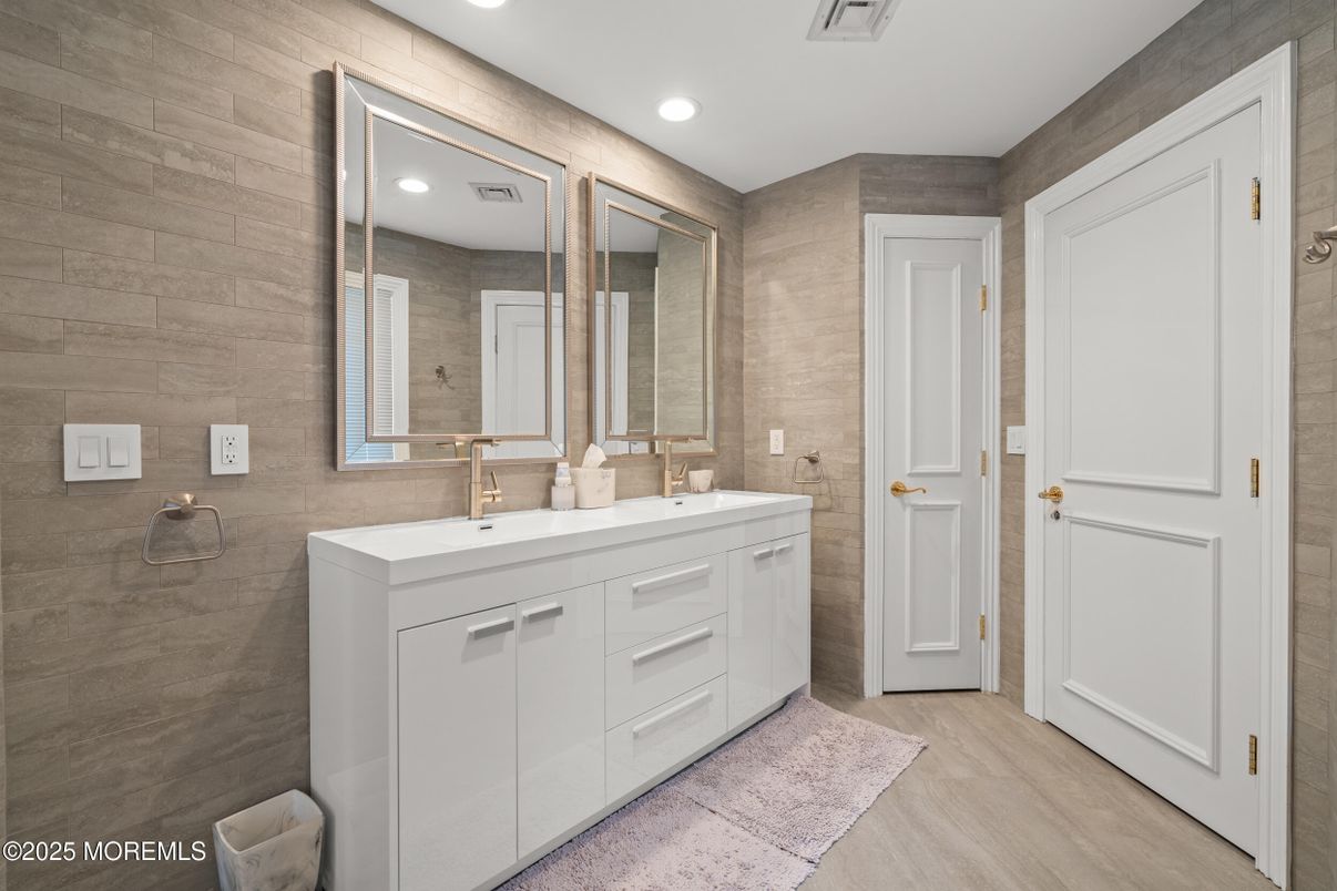 Bathroom, Dual Sink Vanities, Interior, Recessed Lighting, Wood Texture Flooring