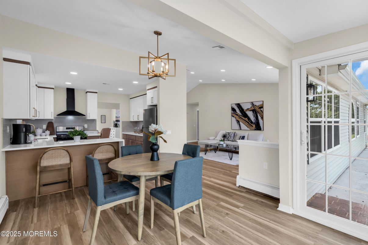 Dining room, Interior, Kitchen, Pendant Lights, Recessed Lighting, Stainless Steel Appliances, Wood Texture Flooring