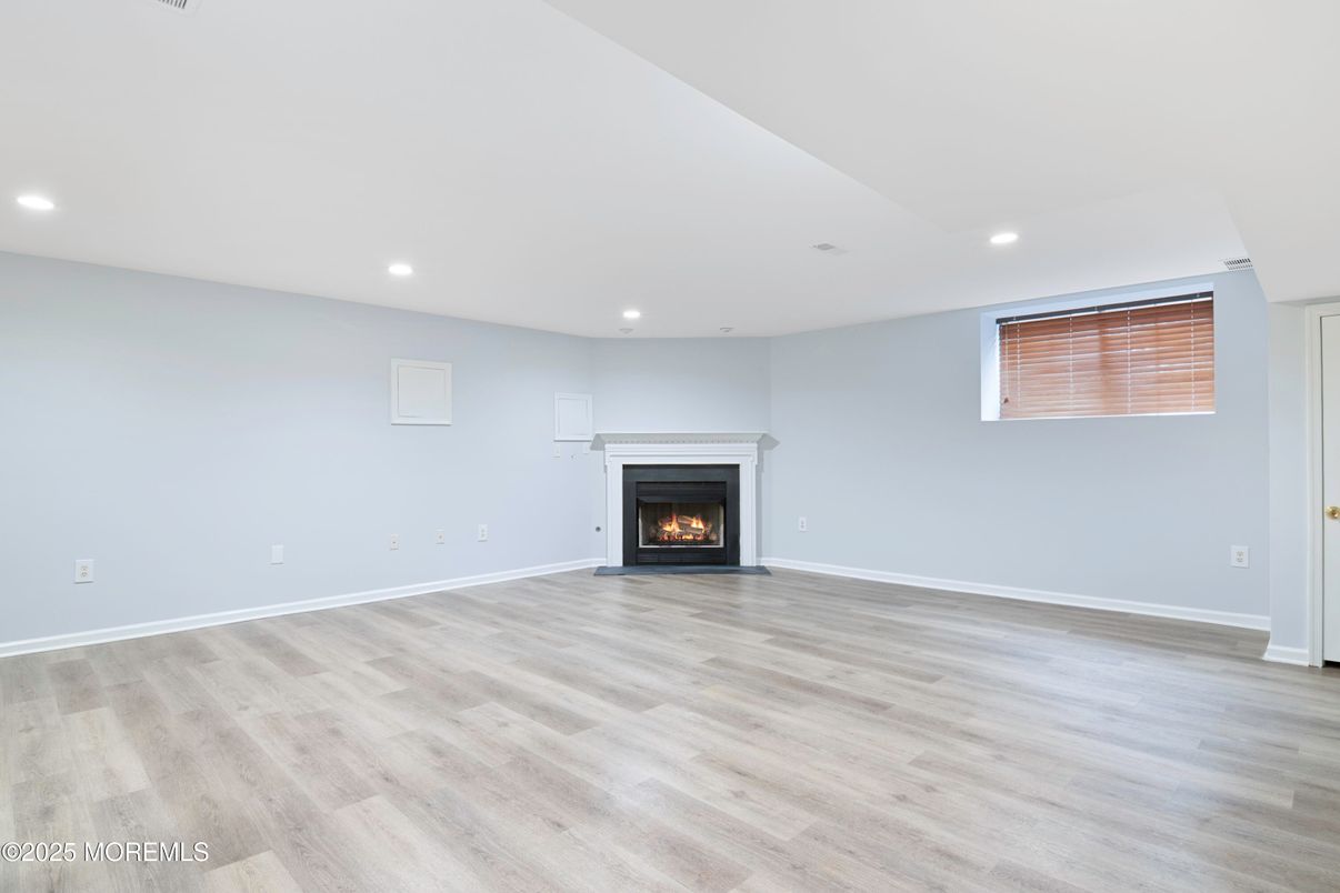 Empty room, Fireplace, Interior, Recessed Lighting, Wood Texture Flooring