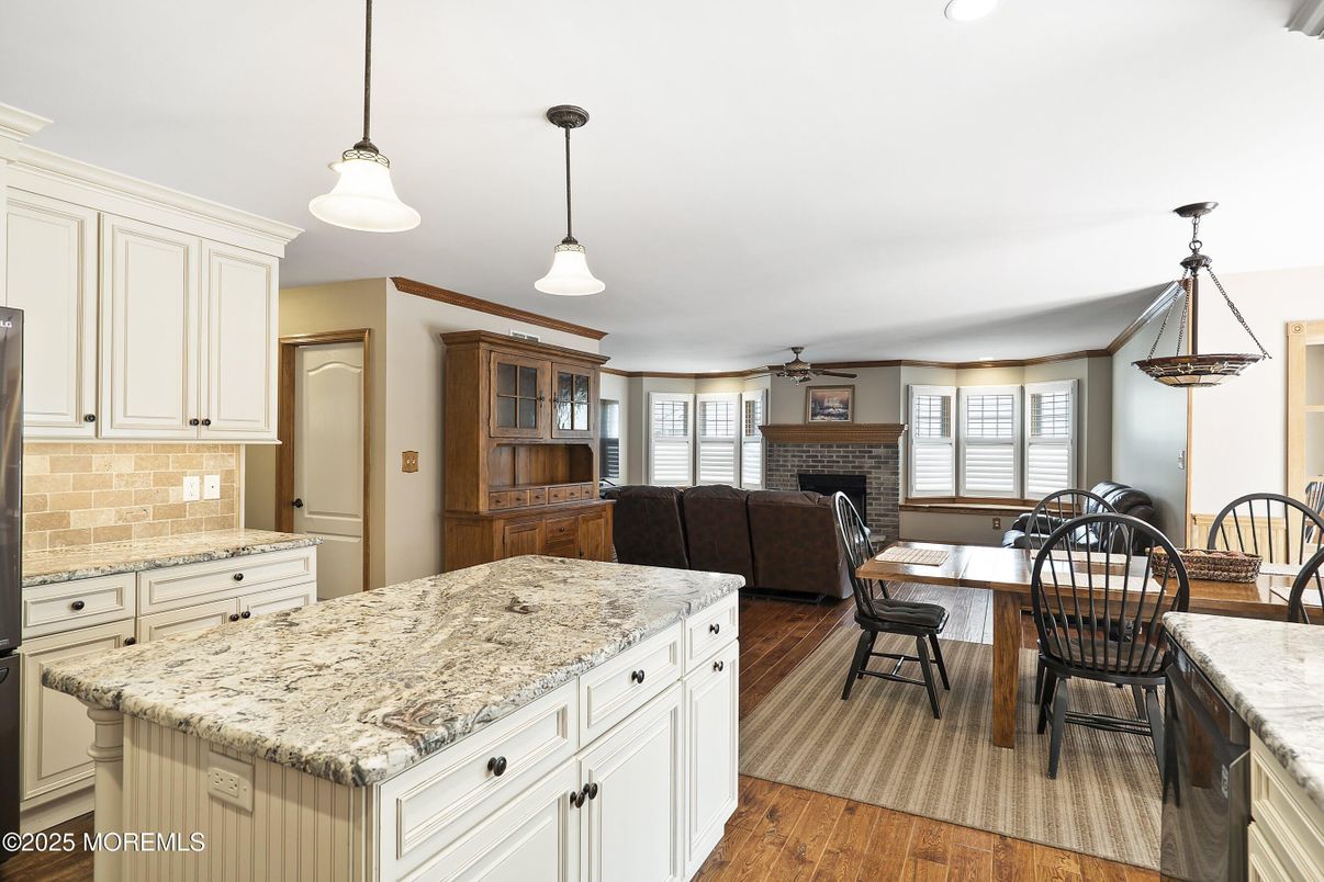 Dining room, Fireplace, Interior, Kitchen, Living room, Pendant Lights, Wood Texture Flooring