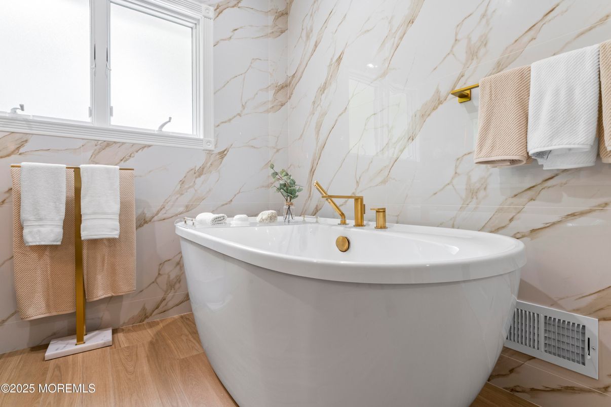 Bathroom, Free Standing Baths, Interior, Marble Walls, Wood Texture Flooring