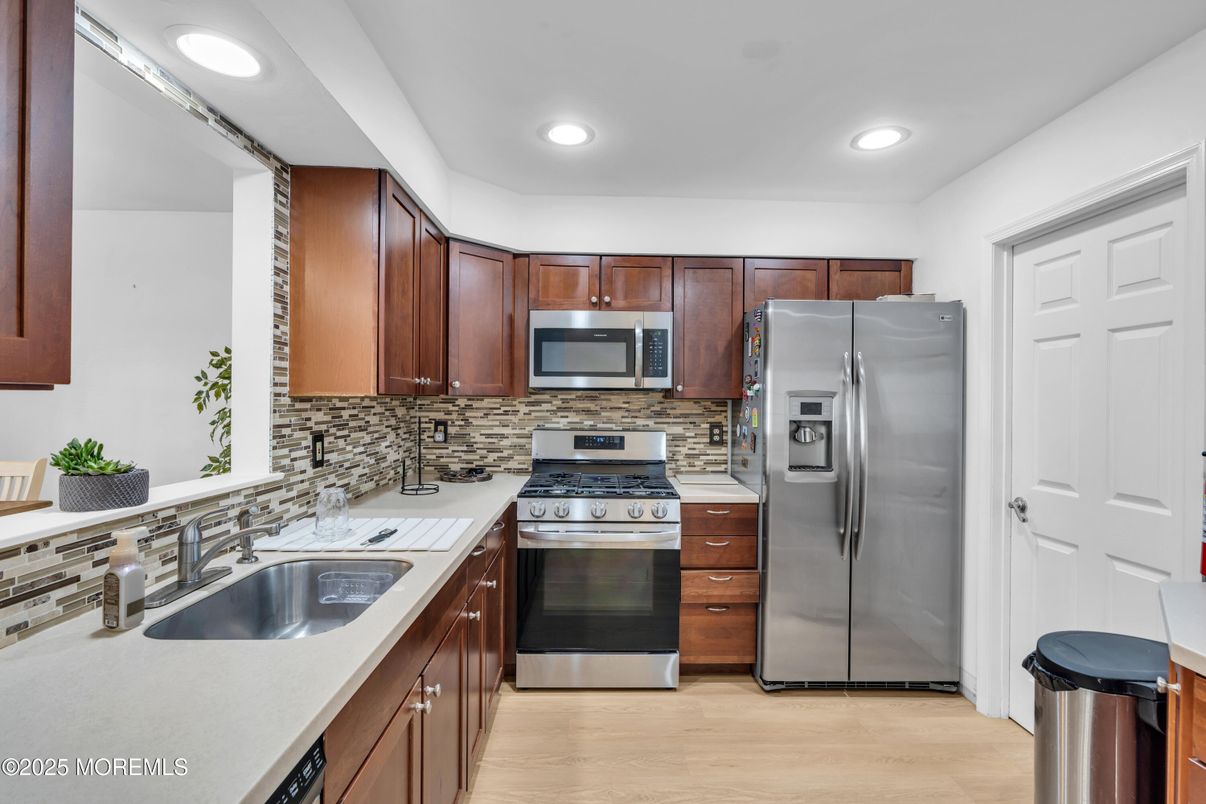 Interior, Kitchen, Recessed Lighting, Stainless Steel Appliances, Wood Texture Flooring