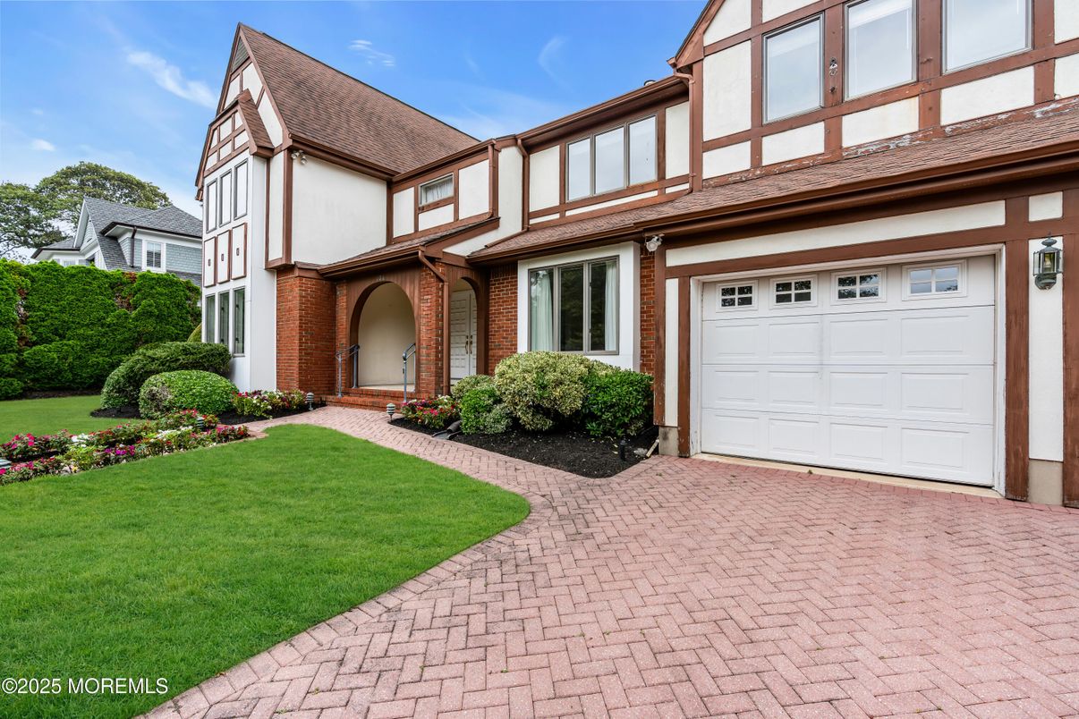Attached, Exterior, Facade, Brick Facade, Tudor Revival