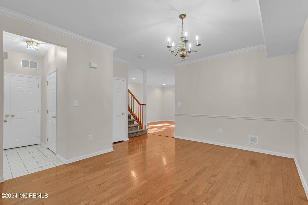 Chandelier, Empty room, Interior, Recessed Lighting, Wood Texture Flooring