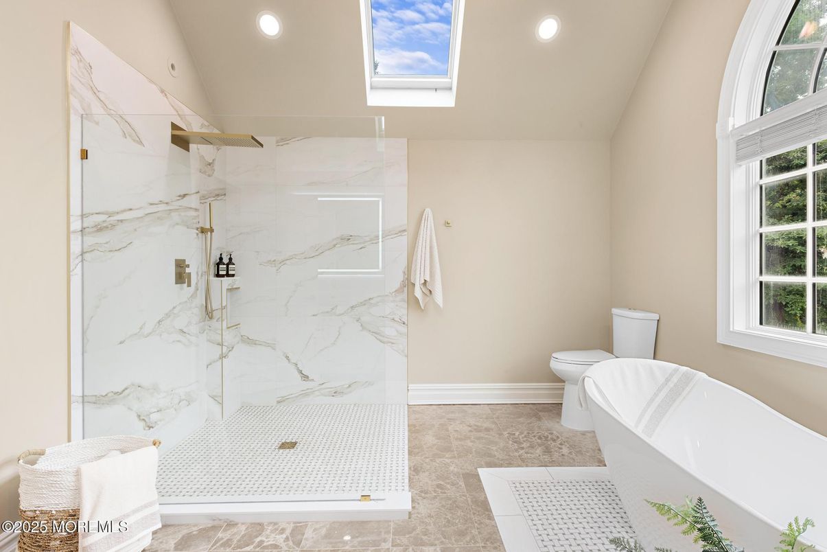 Bathroom, Free Standing Baths, Glass Shower, Interior, Marble Walls, Recessed Lighting