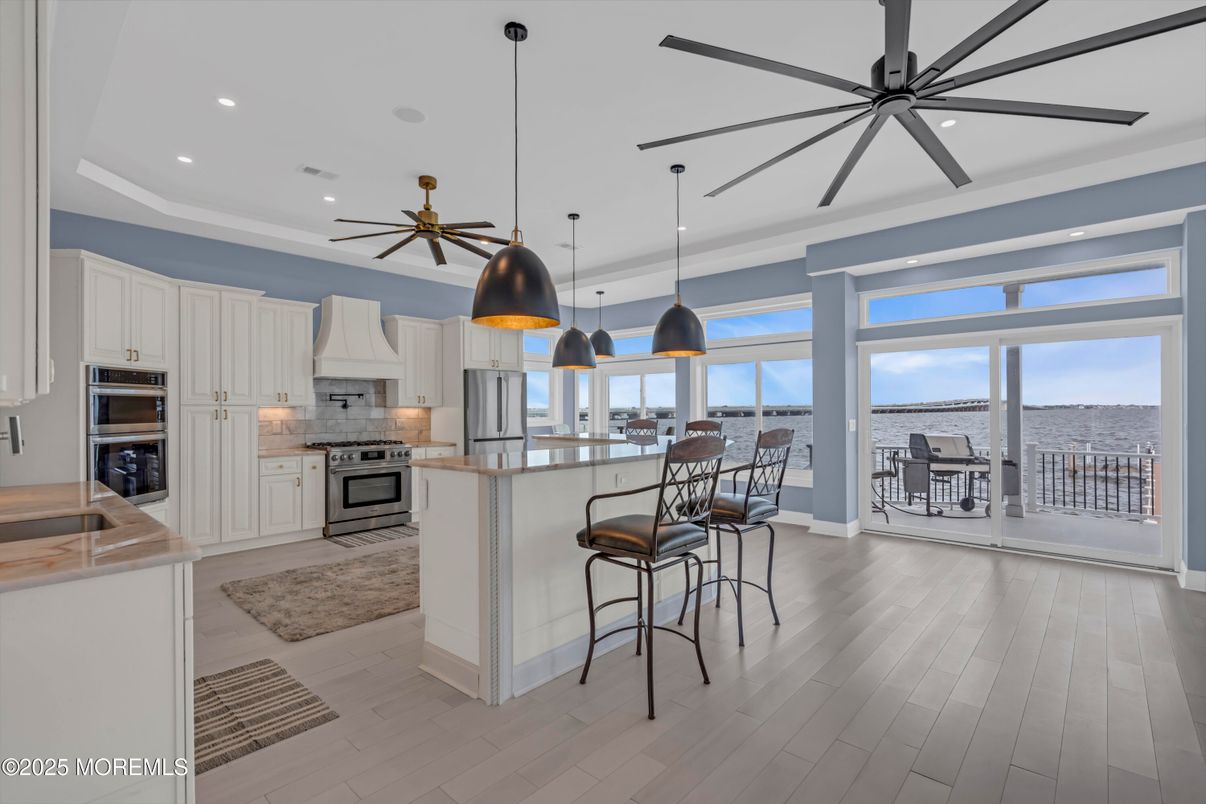 Interior, Kitchen, Pendant Lights, Recessed Lighting, Stainless Steel Appliances, Water, Wood Texture Flooring