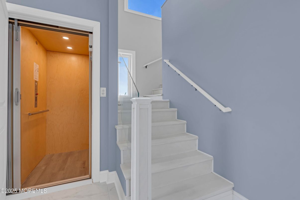 Elevator, Interior, Marble, Recessed Lighting, Wooden Ceilings, Wooden Walls