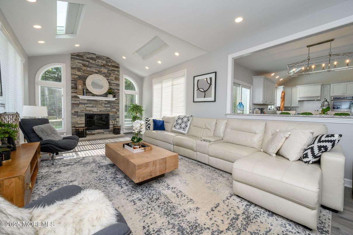 Fireplace, Interior, Kitchen, Living room, Pendant Lights, Recessed Lighting, Stone Walls, Wood Texture Flooring