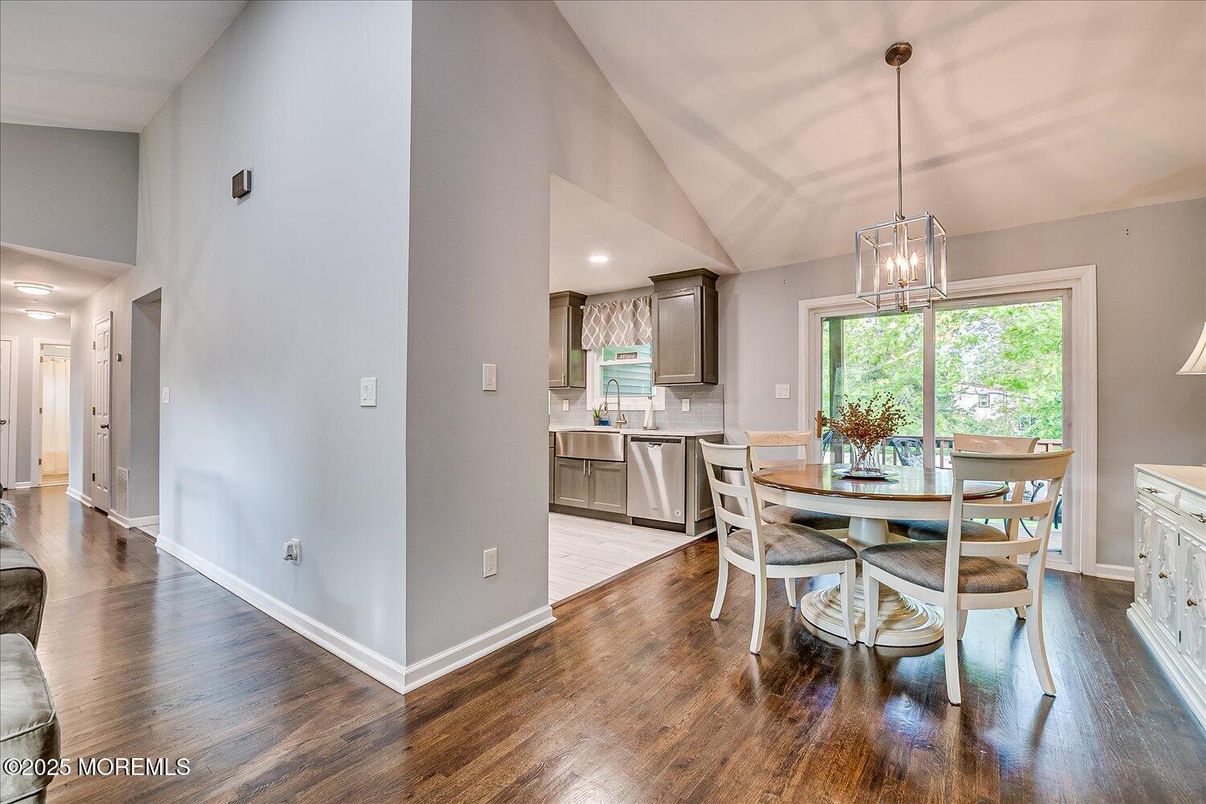 Dining room, Interior, Kitchen, Pendant Lights, Recessed Lighting, Stainless Steel Appliances, Wood Texture Flooring
