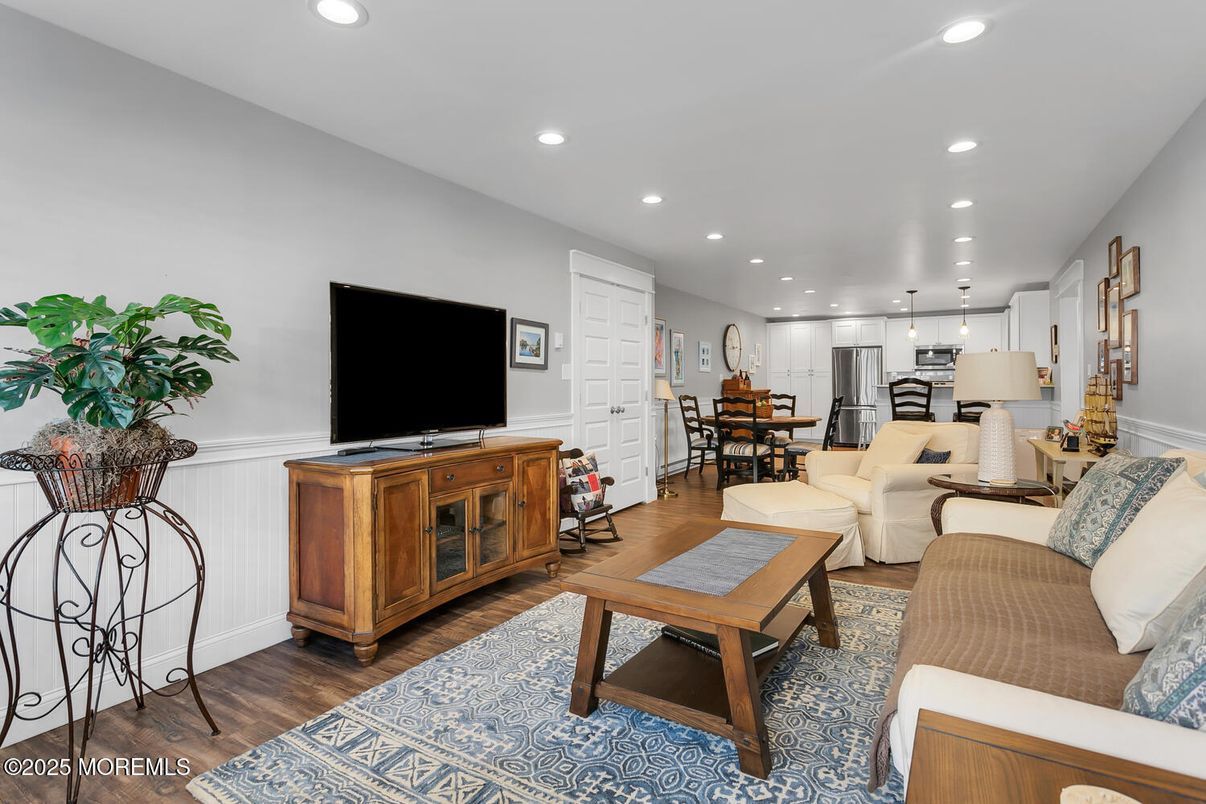 Dining room, Interior, Kitchen, Living room, Recessed Lighting, Stainless Steel Appliances, Wood Texture Flooring