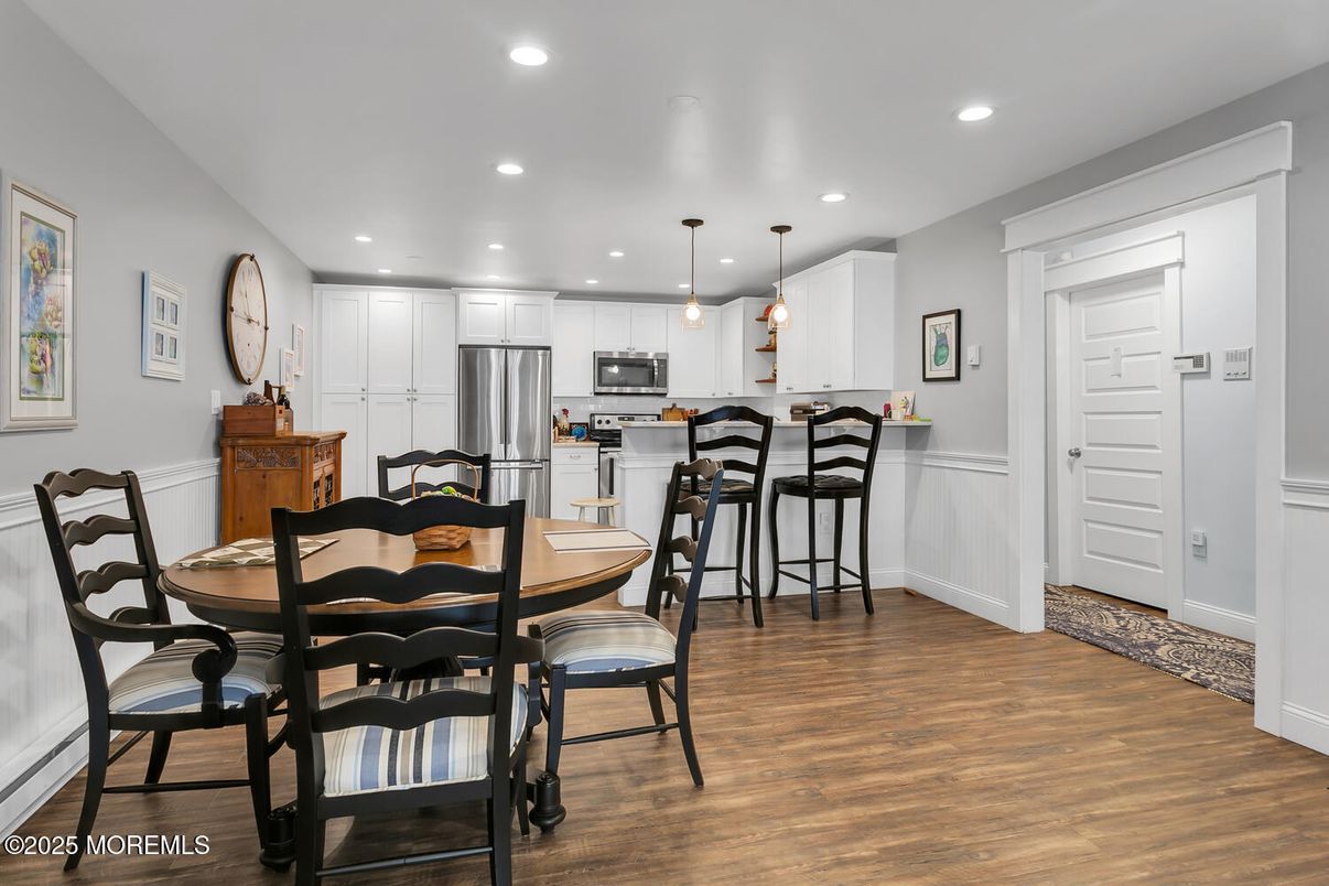 Dining room, Interior, Kitchen, Pendant Lights, Recessed Lighting, Stainless Steel Appliances, Wood Texture Flooring