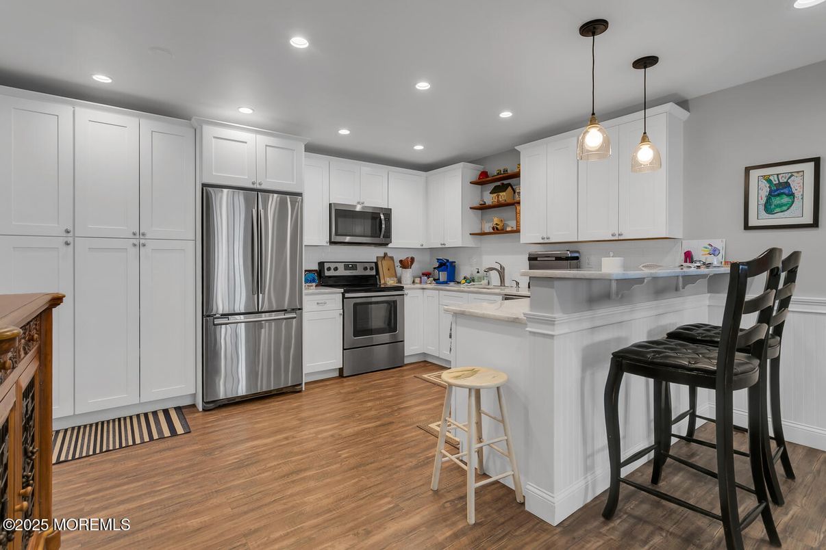 Interior, Kitchen, Pendant Lights, Recessed Lighting, Stainless Steel Appliances, Wood Texture Flooring