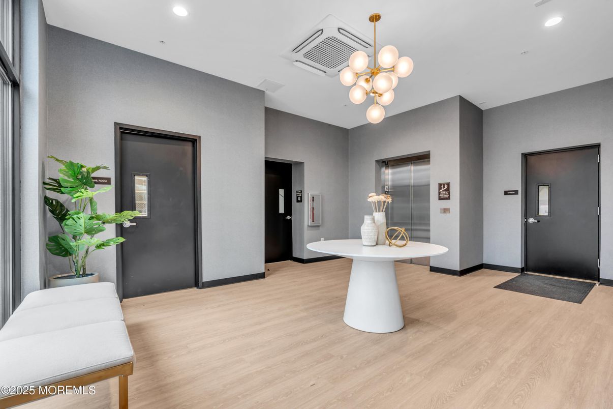 Elevator, Interior, Pendant Lights, Recessed Lighting, Wood Texture Flooring