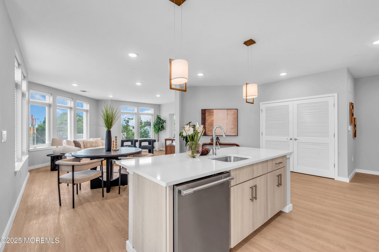 Dining room, Interior, Kitchen, Pendant Lights, Recessed Lighting, Stainless Steel Appliances, Wood Texture Flooring