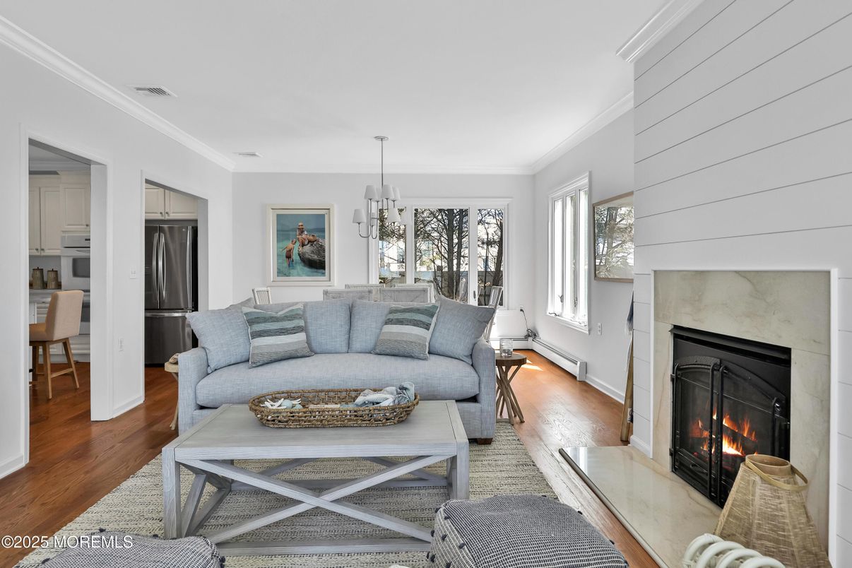 Dining room, Fireplace, Interior, Living room, Pendant Lights, Wood Texture Flooring