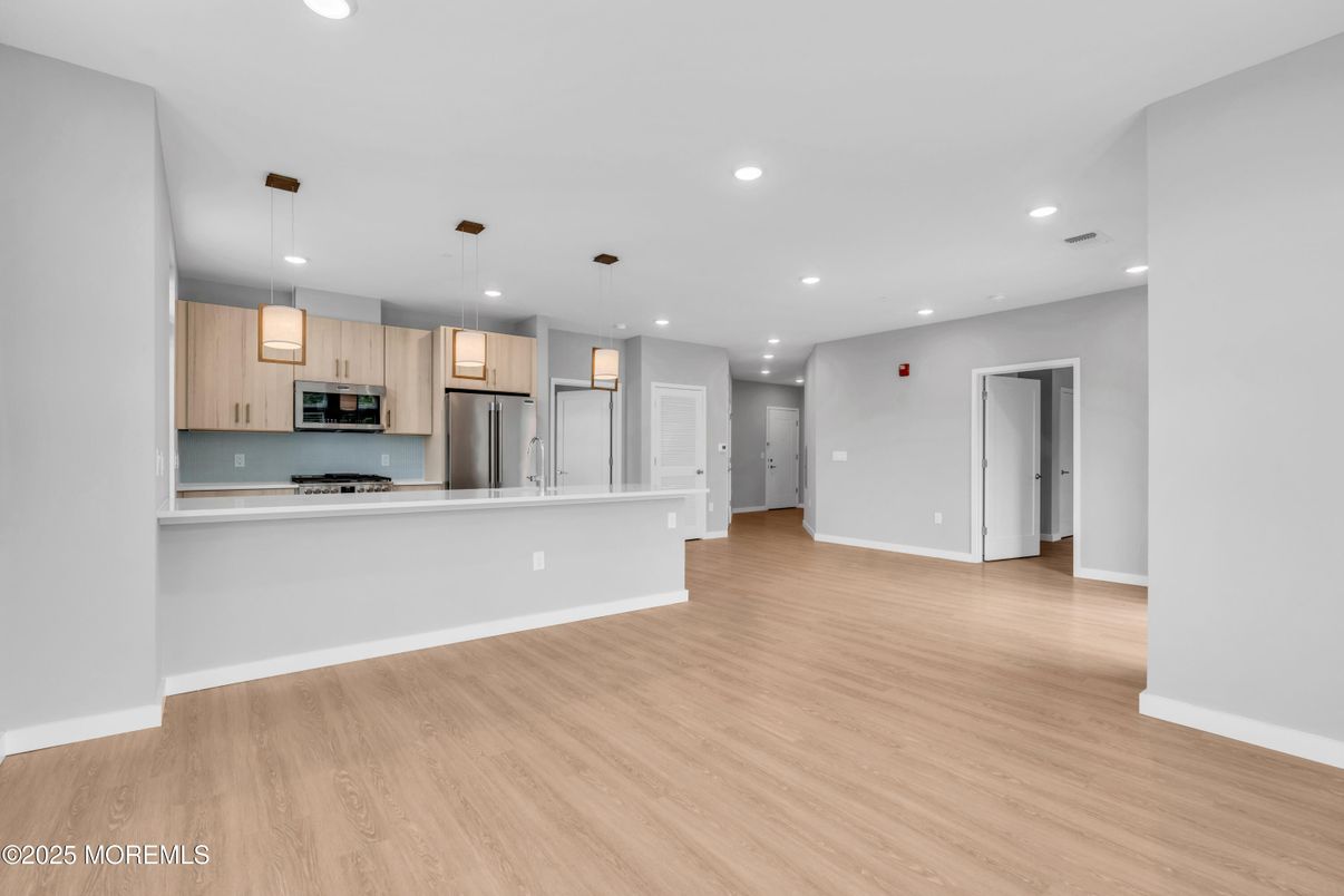 Interior, Kitchen, Pendant Lights, Recessed Lighting, Stainless Steel Appliances, Wood Texture Flooring