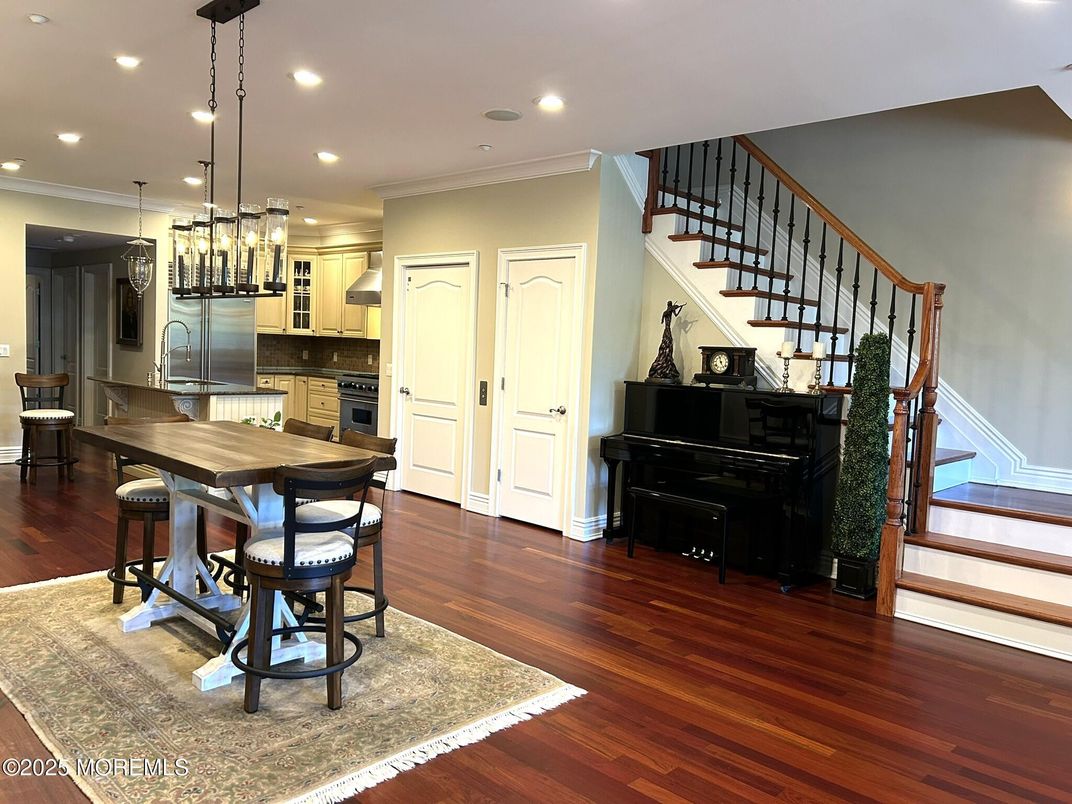 Dining room, Interior, Kitchen, Pendant Lights, Piano, Recessed Lighting, Stainless Steel Appliances, Wood Texture Flooring