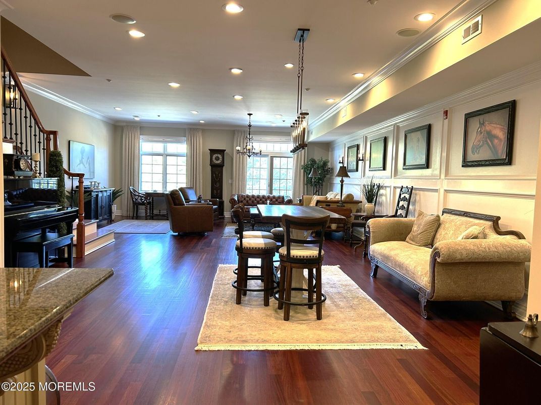 Chandelier, Dining room, Interior, Living room, Pendant Lights, Piano, Recessed Lighting, Wood Texture Flooring