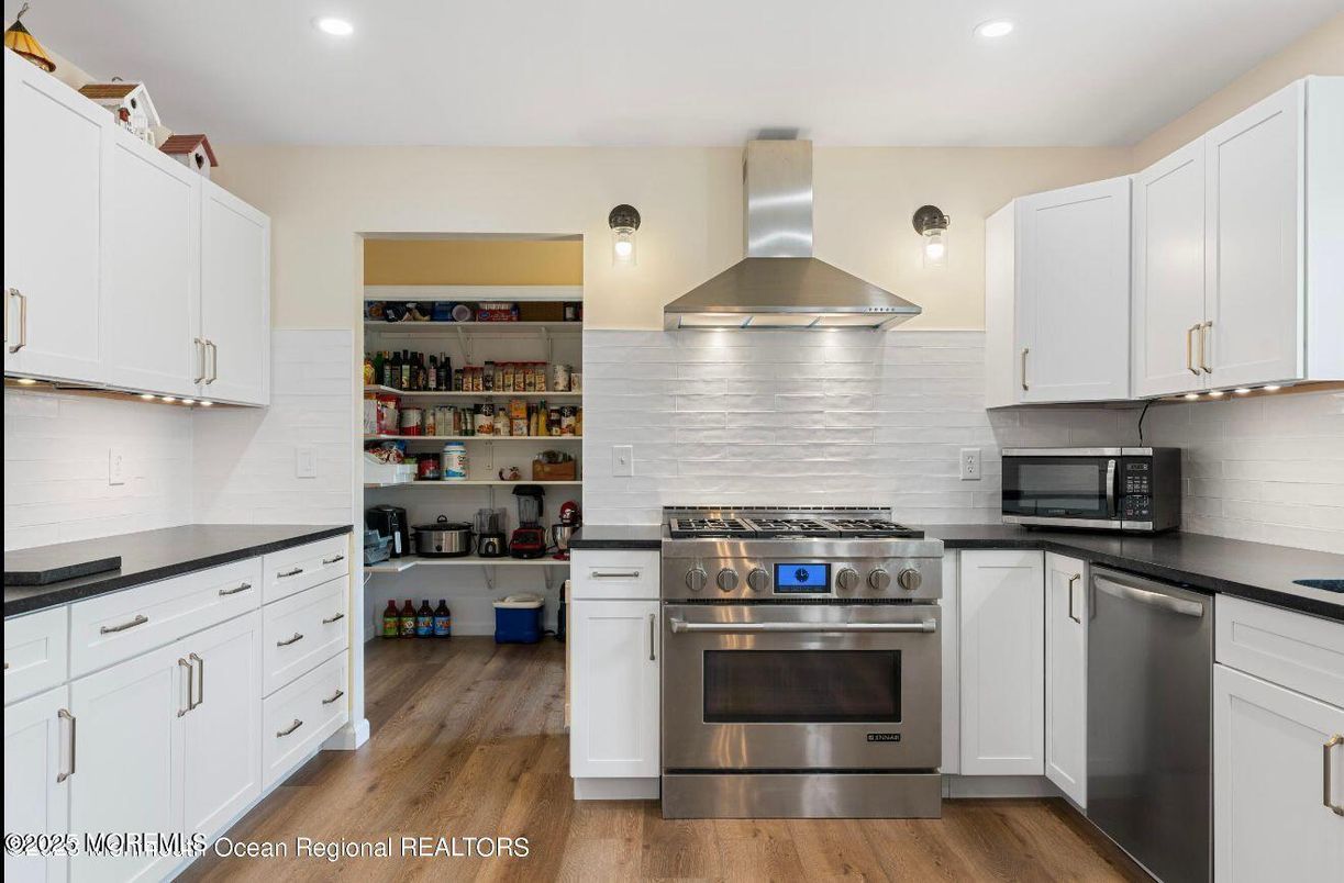 Interior, Kitchen, Recessed Lighting, Stainless Steel Appliances, Wood Texture Flooring