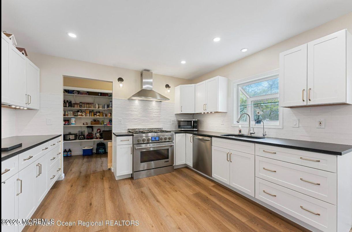 Interior, Kitchen, Recessed Lighting, Stainless Steel Appliances, Wood Texture Flooring