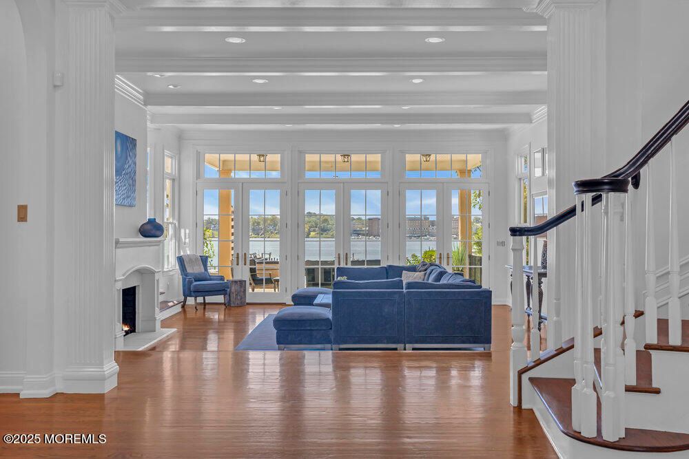 Fireplace, Interior, Living room, Recessed Lighting, Water, Wood Texture Flooring