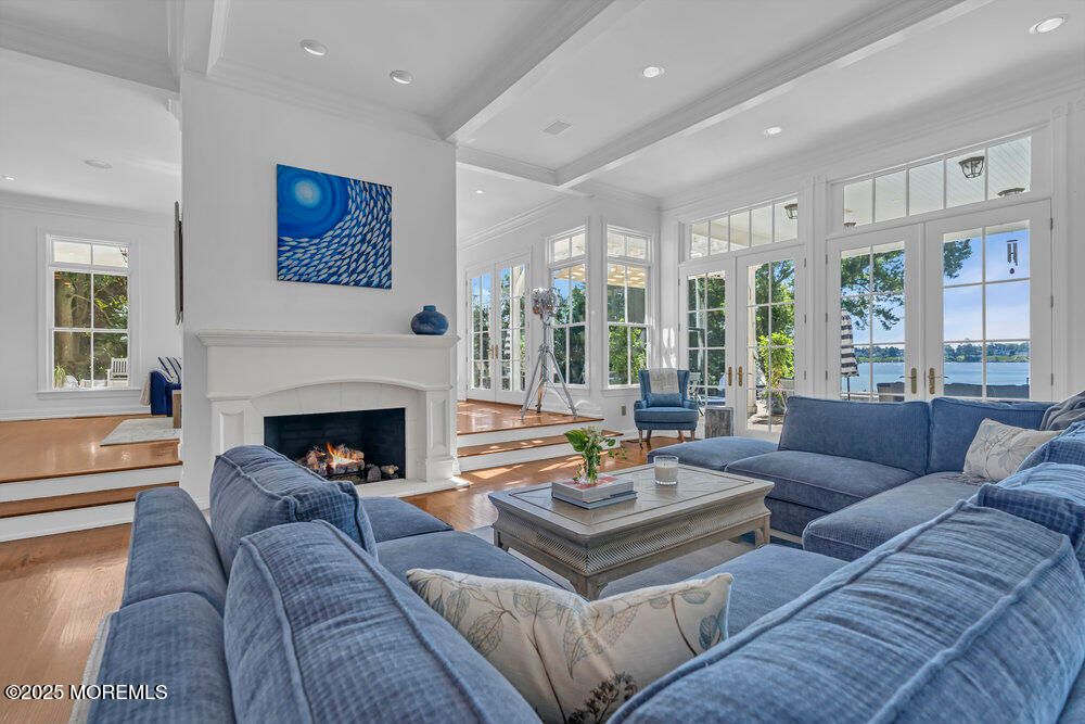 Fireplace, Interior, Living room, Recessed Lighting, Water, Wood Texture Flooring