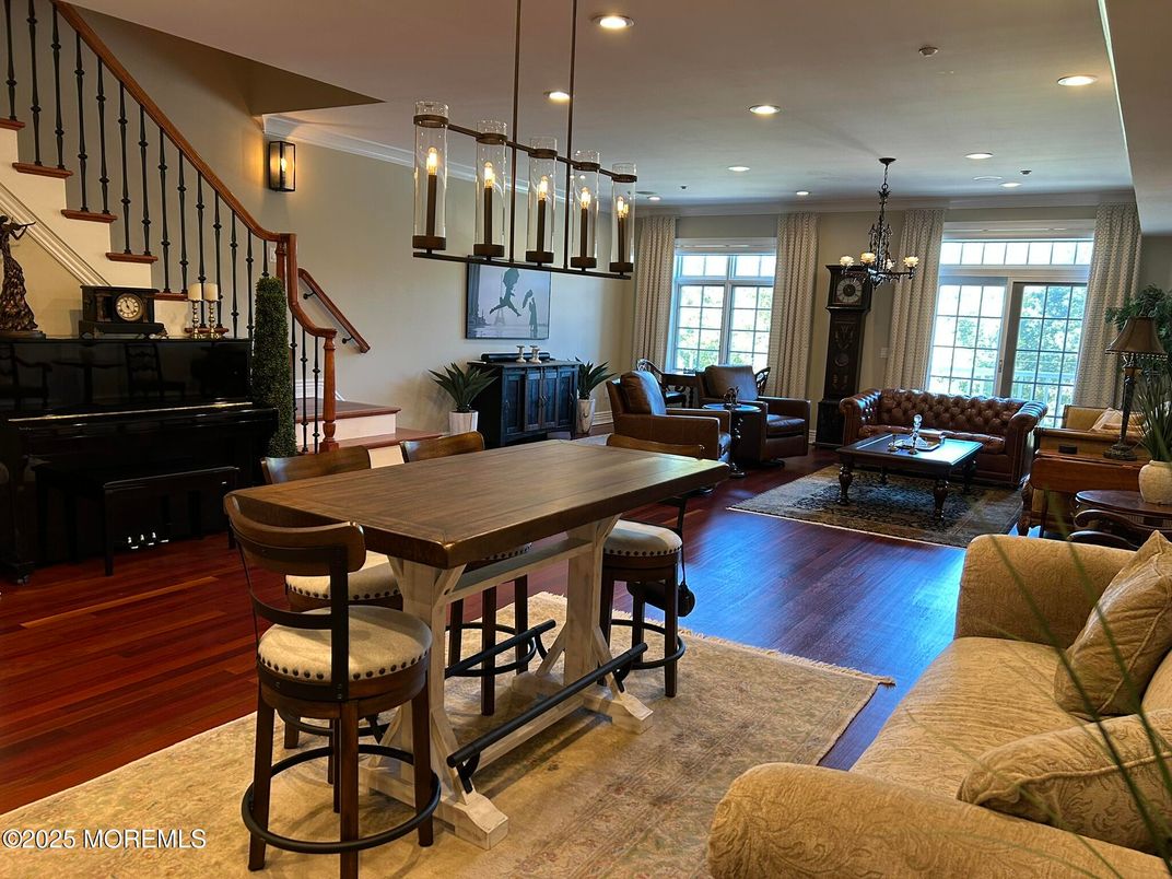 Chandelier, Dining room, Interior, Living room, Pendant Lights, Piano, Recessed Lighting, Wood Texture Flooring