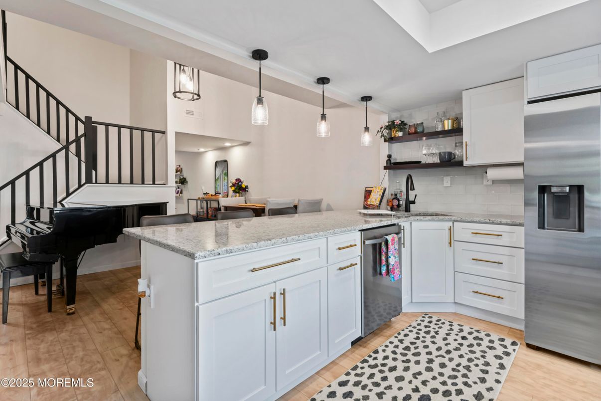 Interior, Kitchen, Pendant Lights, Piano, Stainless Steel Appliances, Wood Texture Flooring