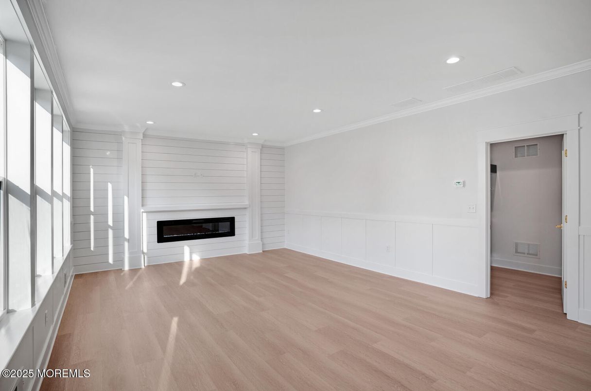 Empty room, Fireplace, Interior, Recessed Lighting, Wood Texture Flooring
