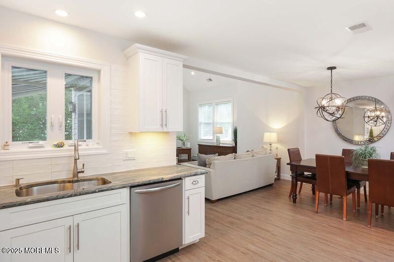 Dining room, Interior, Kitchen, Living room, Pendant Lights, Recessed Lighting, Wood Texture Flooring