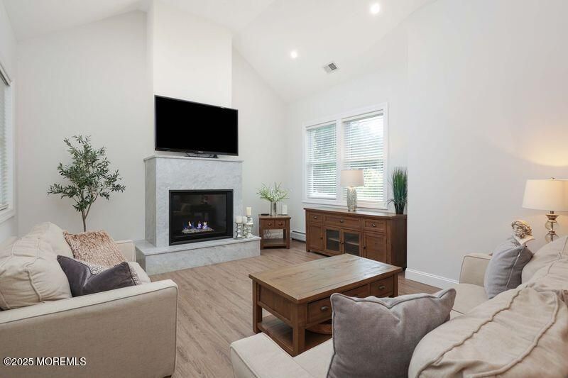 Fireplace, Interior, Living room, Recessed Lighting, Wood Texture Flooring