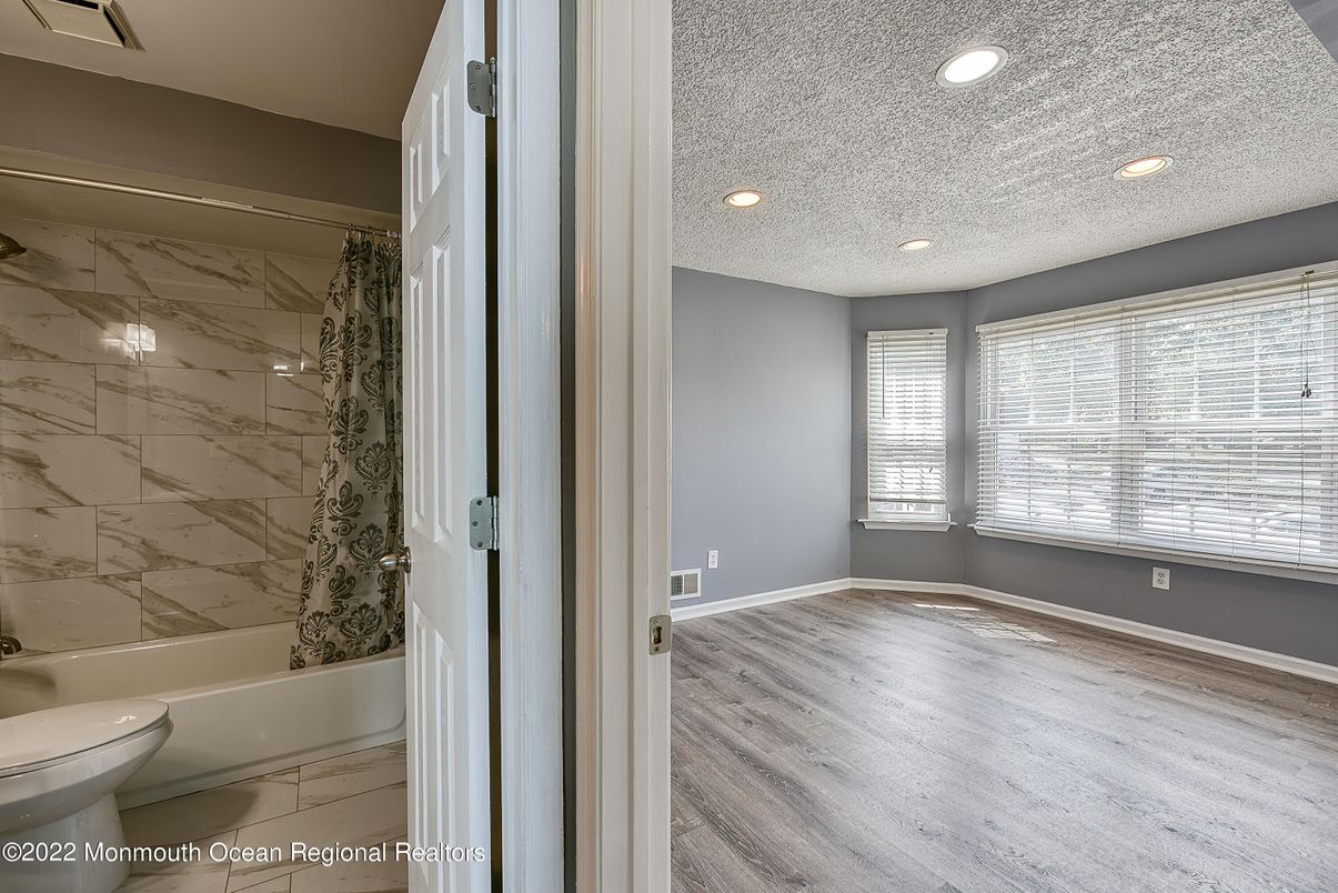 Bathroom, Interior, Marble Walls, Recessed Lighting, Wood Texture Flooring
