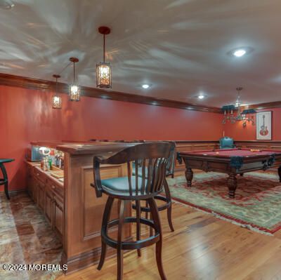Billiard Table, Chandelier, Game Room, Interior, Pendant Lights, Recessed Lighting, Wood Texture Flooring